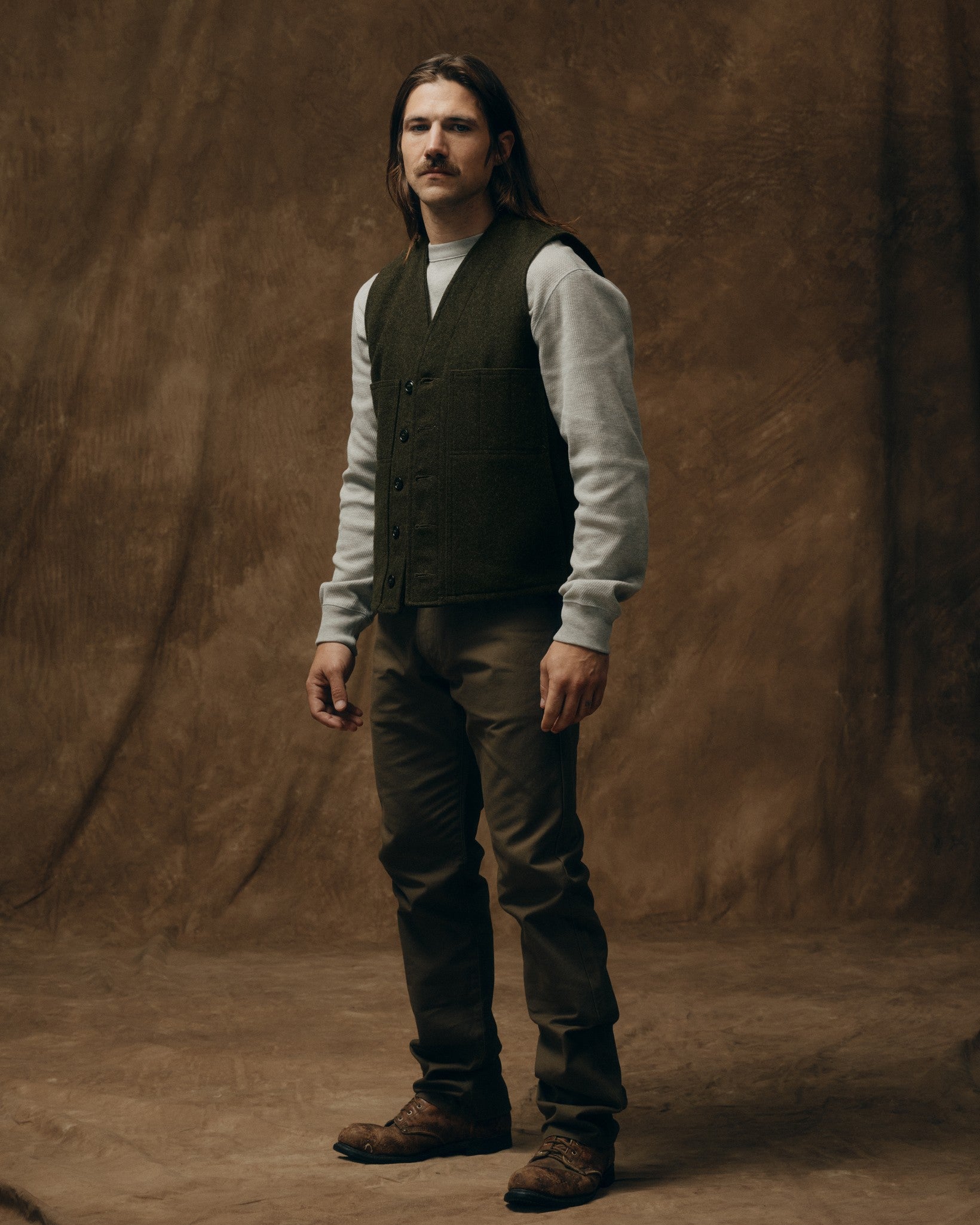 Christopher is 5'10" wearing a size Medium