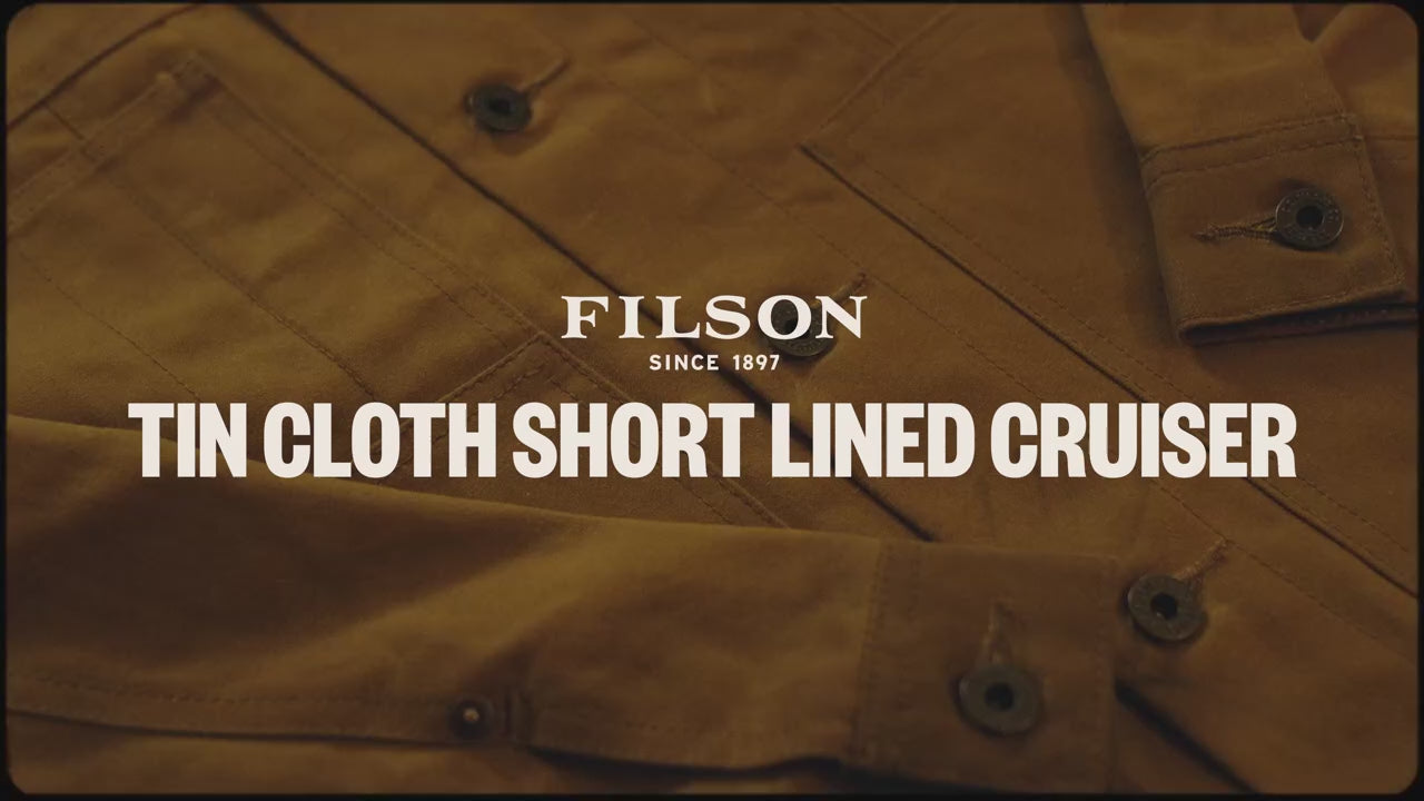 Load video: Cozyhomegoodmark employee describing the features of the Tin Cloth Short Lined Cruiser.